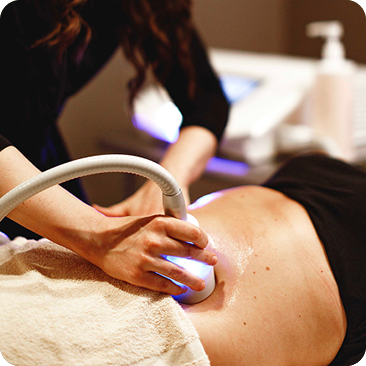 - The Renaissance Day Spa & Alternative Wellness, Fayetteville NC A person receives a body toning and contouring treatment with a handheld ultrasound or radiofrequency device on their abdomen in a spa or clinic, often as part of holistic alternative therapies. - The Renaissance Day Spa & Alternative Wellness, Fayetteville NC